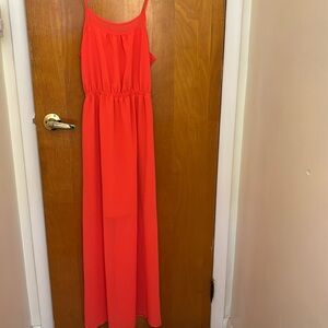 Beautiful long , sleeveless summer dress with underskirt.